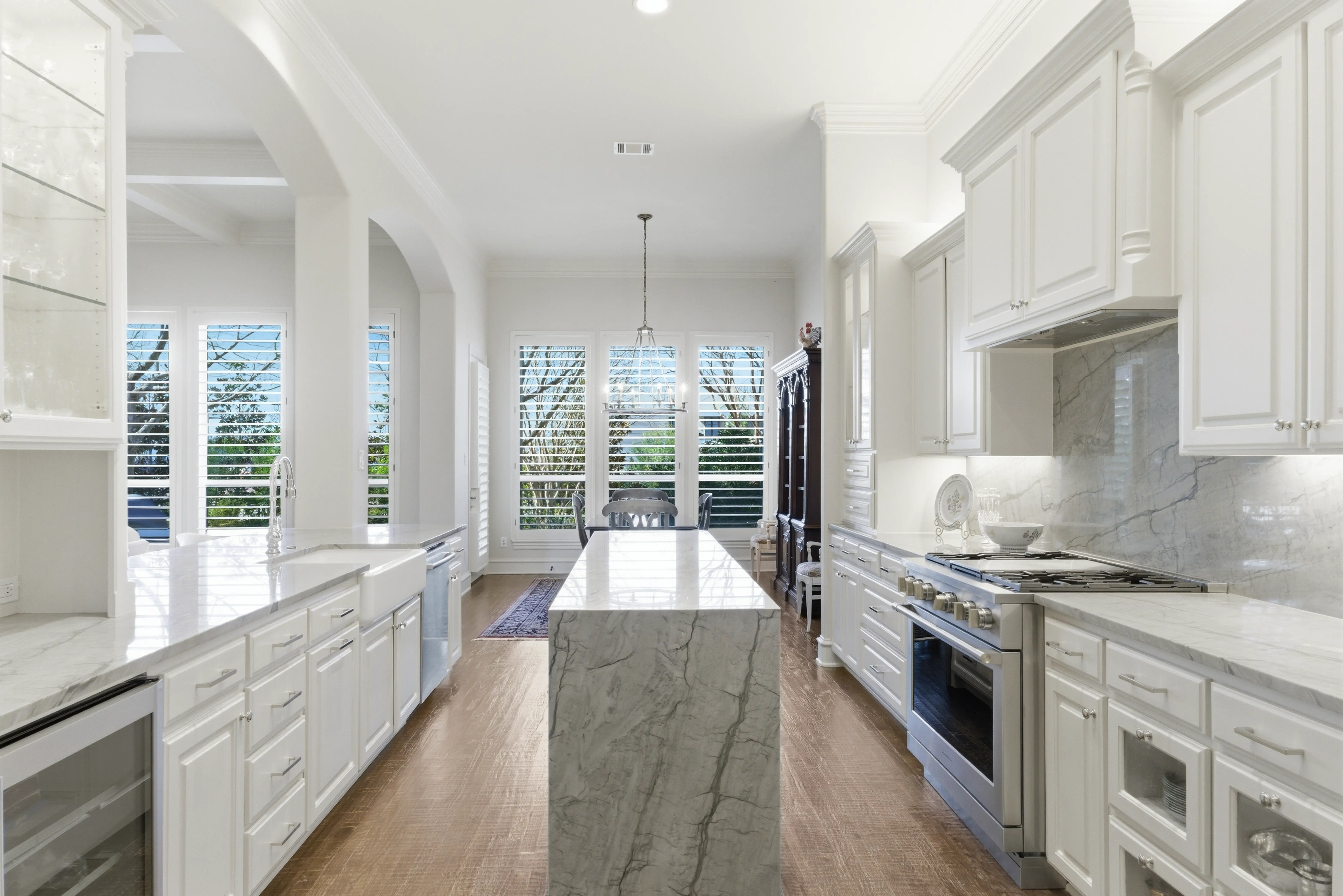 Kitchen showing professional-grade appliances and quartzite countertops